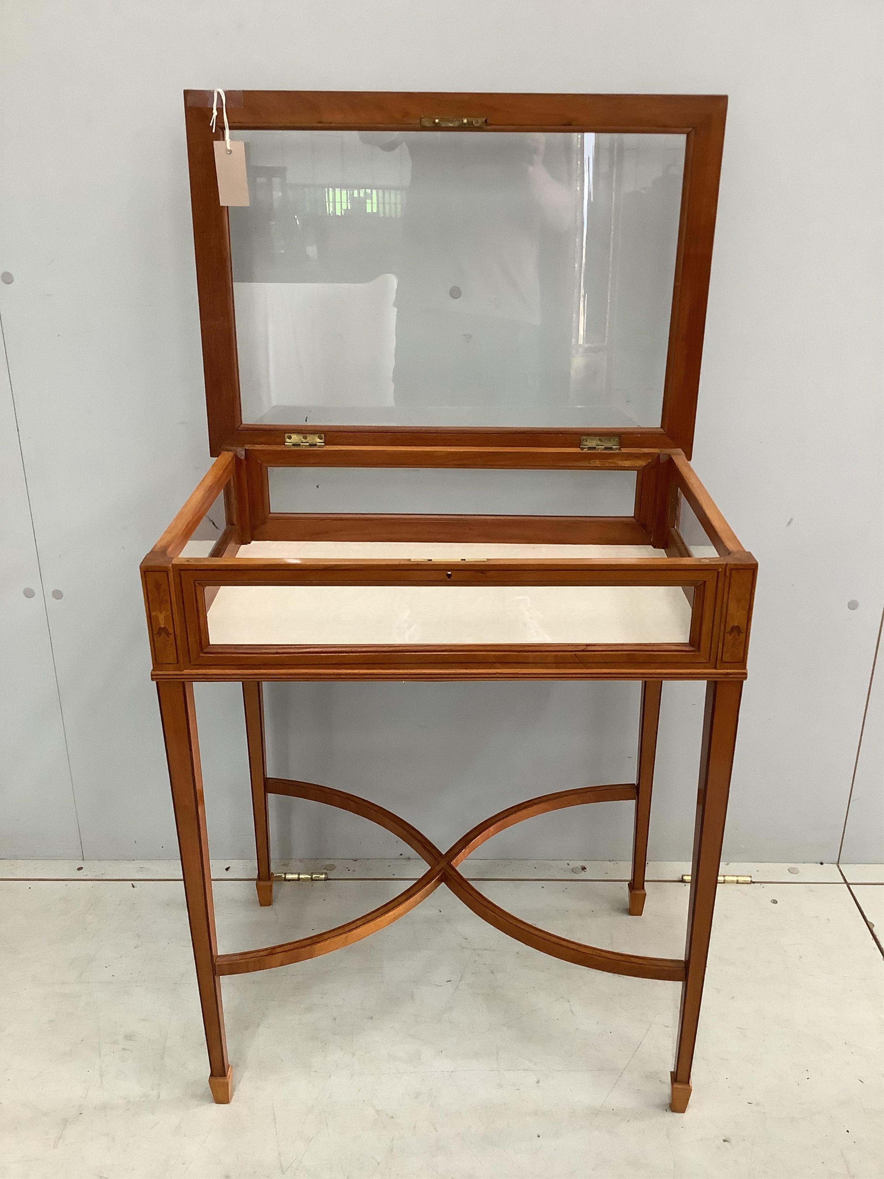 An Edwardian inlaid satinwood bijouterie table, width 61cm, depth 42cm, height 74cm